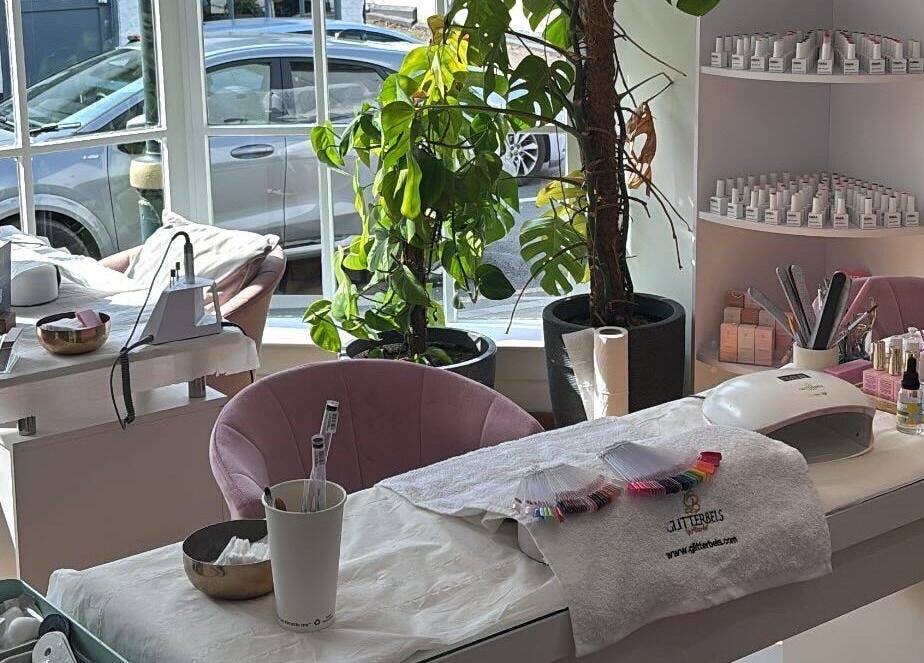 Bright nail salon setup at Glow Up With Molly in Wheathampstead, England, GB, showcasing manicure essentials.