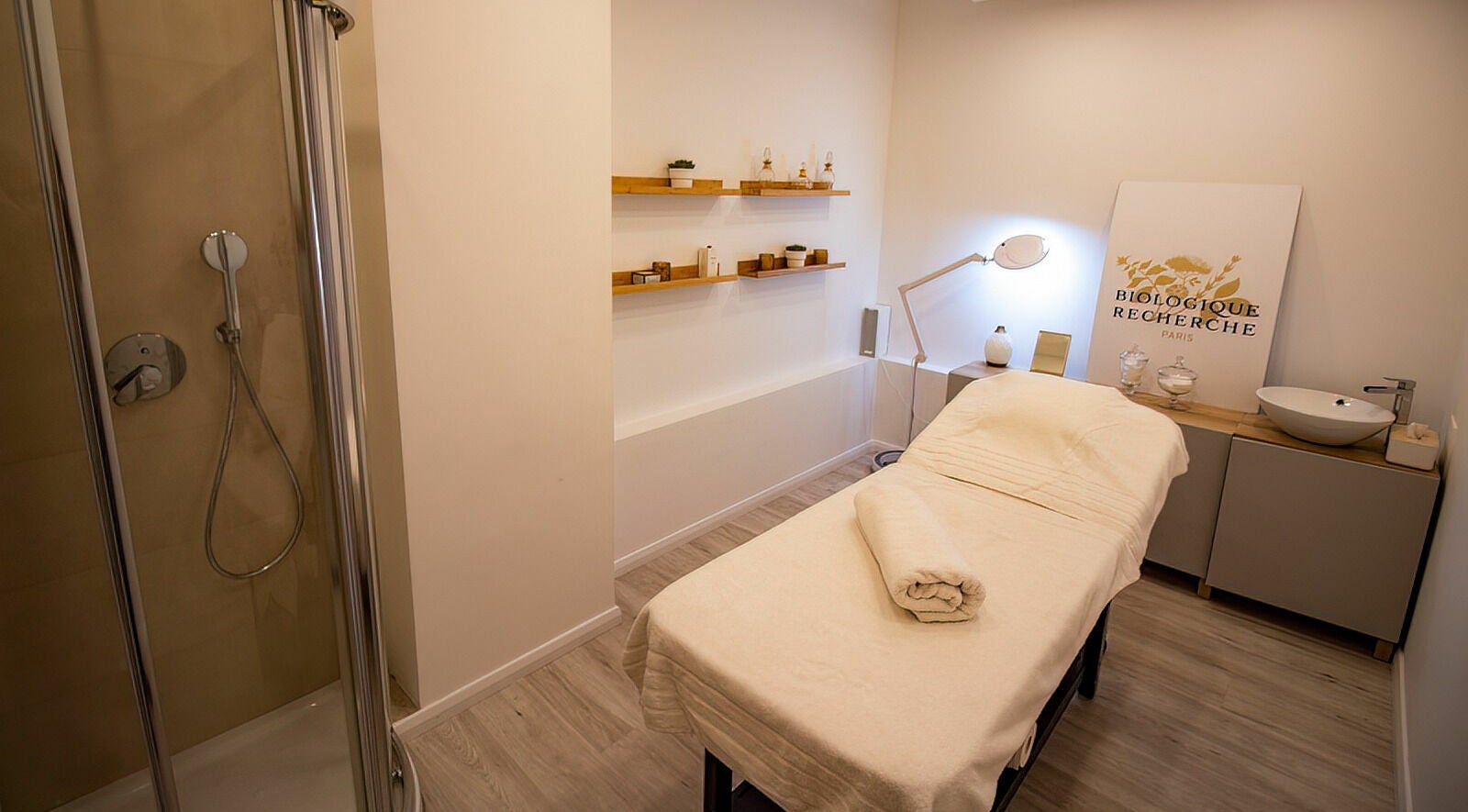 Relaxing treatment room at Studio 44 On Madison, Gibraltar, GI with massage bed and soothing decor.