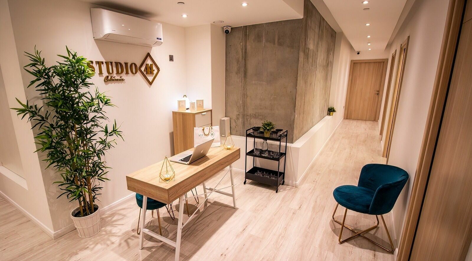 Elegant reception at Studio 44 On Madison, Gibraltar, GI featuring stylish decor and chic seating.