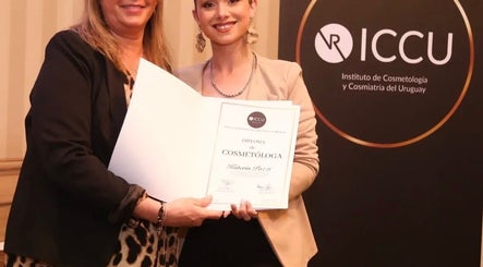 Graduate receives cosmetology diploma at K Beauty Studio, Maldonado, Departamento De Maldonado, UY.