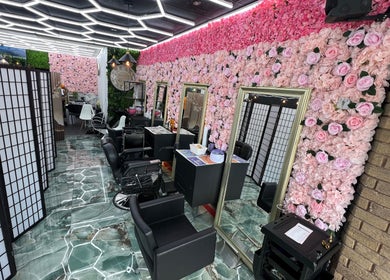 Stylish interior of Lady's Lux Beauty in Salford, England, with floral decor and sleek design.