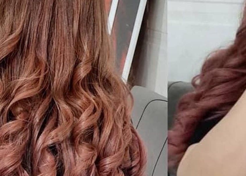 Elegant curled hairstyle at Lady’s Lux Beauty, Salford, England, GB.