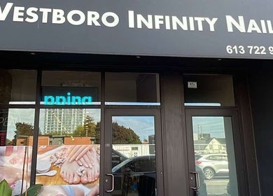 Entrance of Westboro Infinity Nails, Ottawa, Ontario, CA, with signage and glass doors.