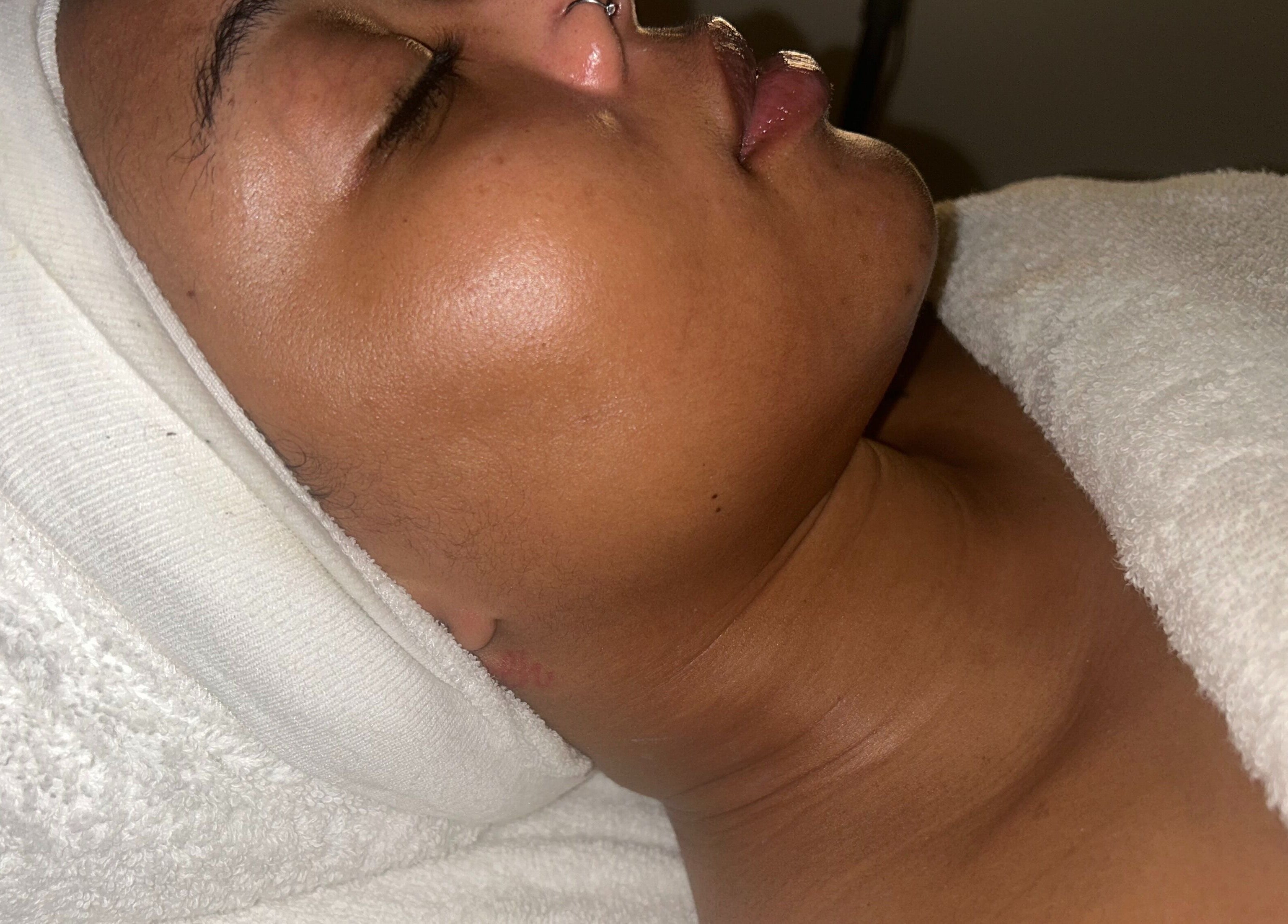 Relaxing facial treatment at Skin Knead Beauty in Nassau, New Providence, BS enhances skin's natural glow.