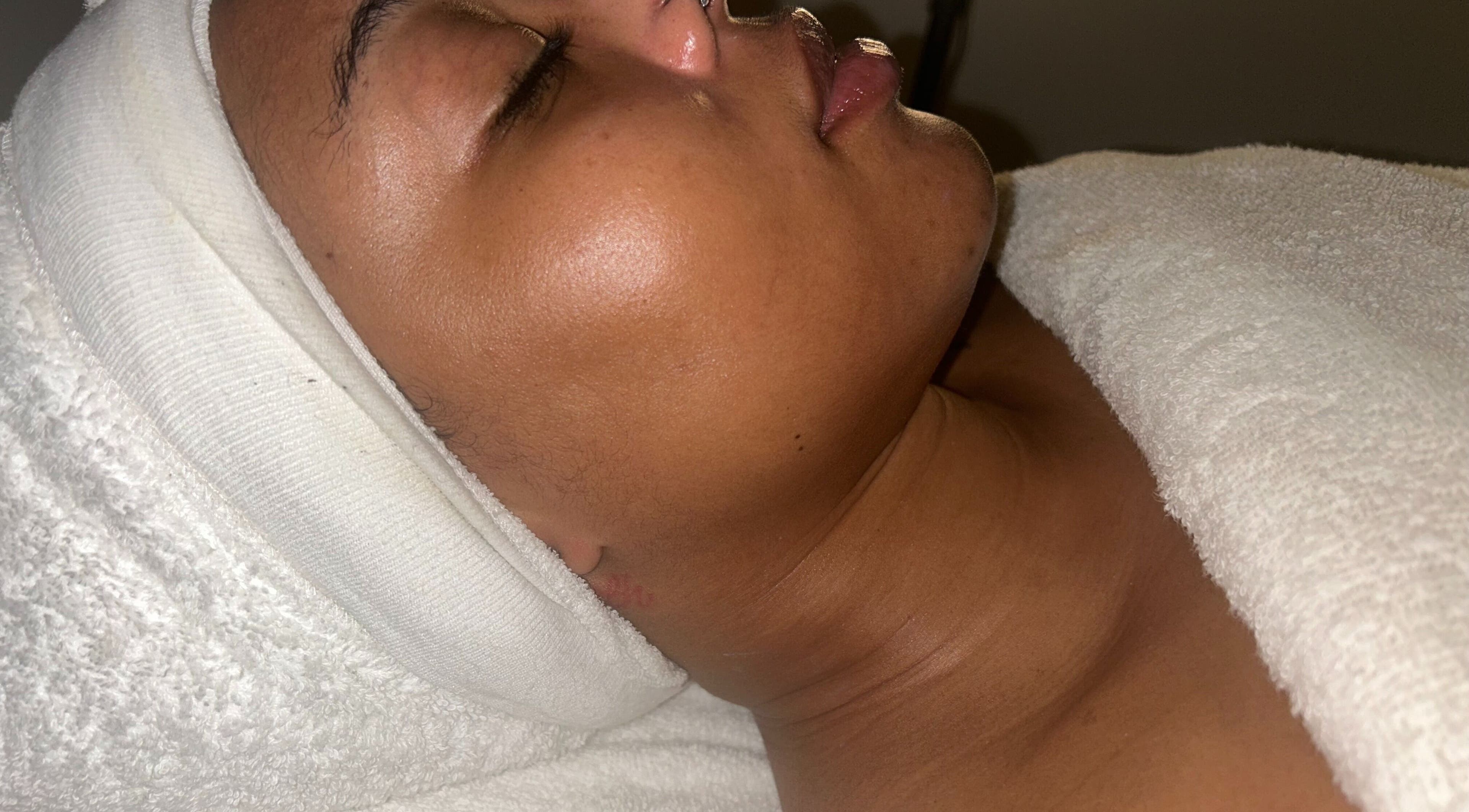 Relaxing facial treatment at Skin Knead Beauty in Nassau, New Providence, BS enhances skin's natural glow.