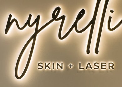 Glowing NYRELLI Skin + Laser sign at Toronto, Ontario, CA.