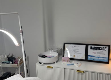 Certificates and equipment at Lashesbyvioletn, Elizabeth Hills, New South Wales, AU, showcasing professionalism.