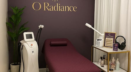 Cozy treatment room at O Radiance Body Sculpting & Wellness, Fayetteville, North Carolina, featuring modern equipment.