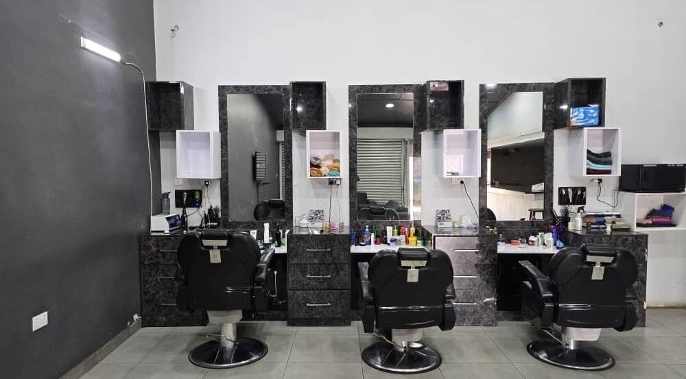 Modern salon chairs and mirrors at City Fades, Lusaka, Lusaka Province, ZM.