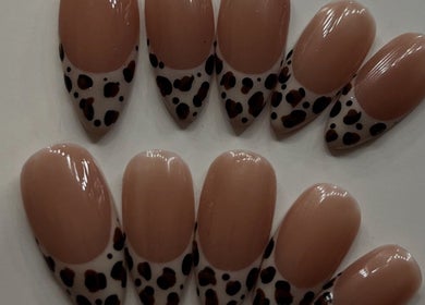 Leopard print nail tips at Lavena Beauty, Port Kennedy, Western Australia, AU for a stylish touch.