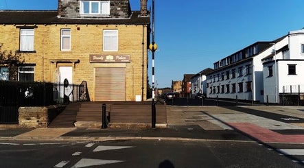Street view of The Hairdeck, a charming venue in Pudsey, England, GB showcasing its welcoming exterior.