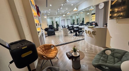 Elegant interior of Sgc Barbershop in Dubai, Dubai, AE showcasing modern chairs and stylish decor.