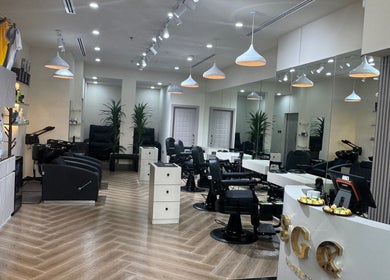 Sgc Barbershop interior with sleek chairs in Dubai, Dubai, AE. Modern and inviting barbershop design.
