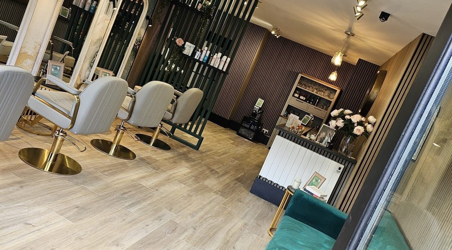 Elegant interior of Vibe Hair Spa in Co Wicklow, IE, featuring stylish chairs and polished decor.