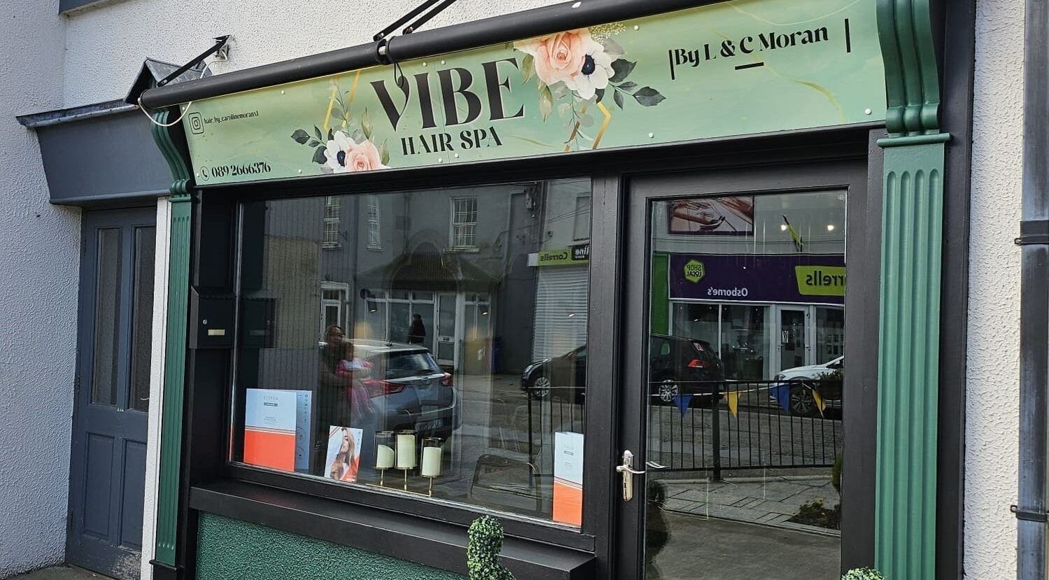 Exterior view of Vibe Hair Spa in Co Wicklow, IE, showcasing the elegant storefront design.