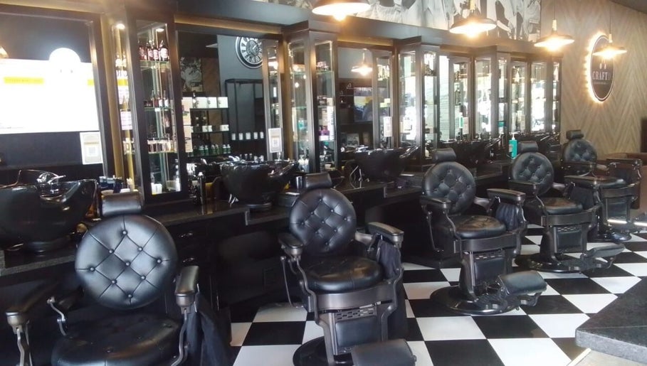 Luxurious barber chairs at CraftD Studios, Randburg, Gauteng, ZA, offering premium wellness experiences.