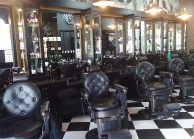 Luxurious barber chairs at CraftD Studios, Randburg, Gauteng, ZA, offering premium wellness experiences.
