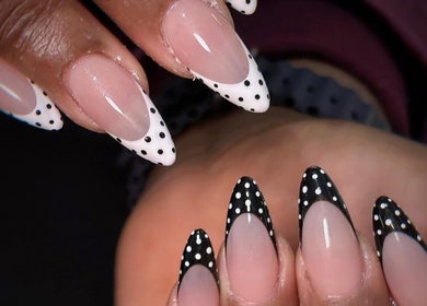 Polka dot nail art at Kimmy Nails Studio, Melbourne, Victoria, AU, showcasing elegant black and white designs.