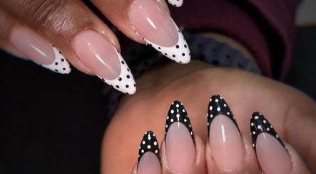 Polka dot nail art at Kimmy Nails Studio, Melbourne, Victoria, AU, showcasing elegant black and white designs.