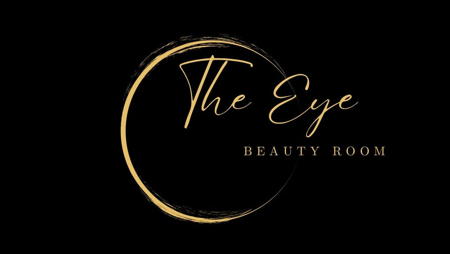 Logo of The Eye Beauty Room in Peterborough, England, GB with gold circular design on black background.