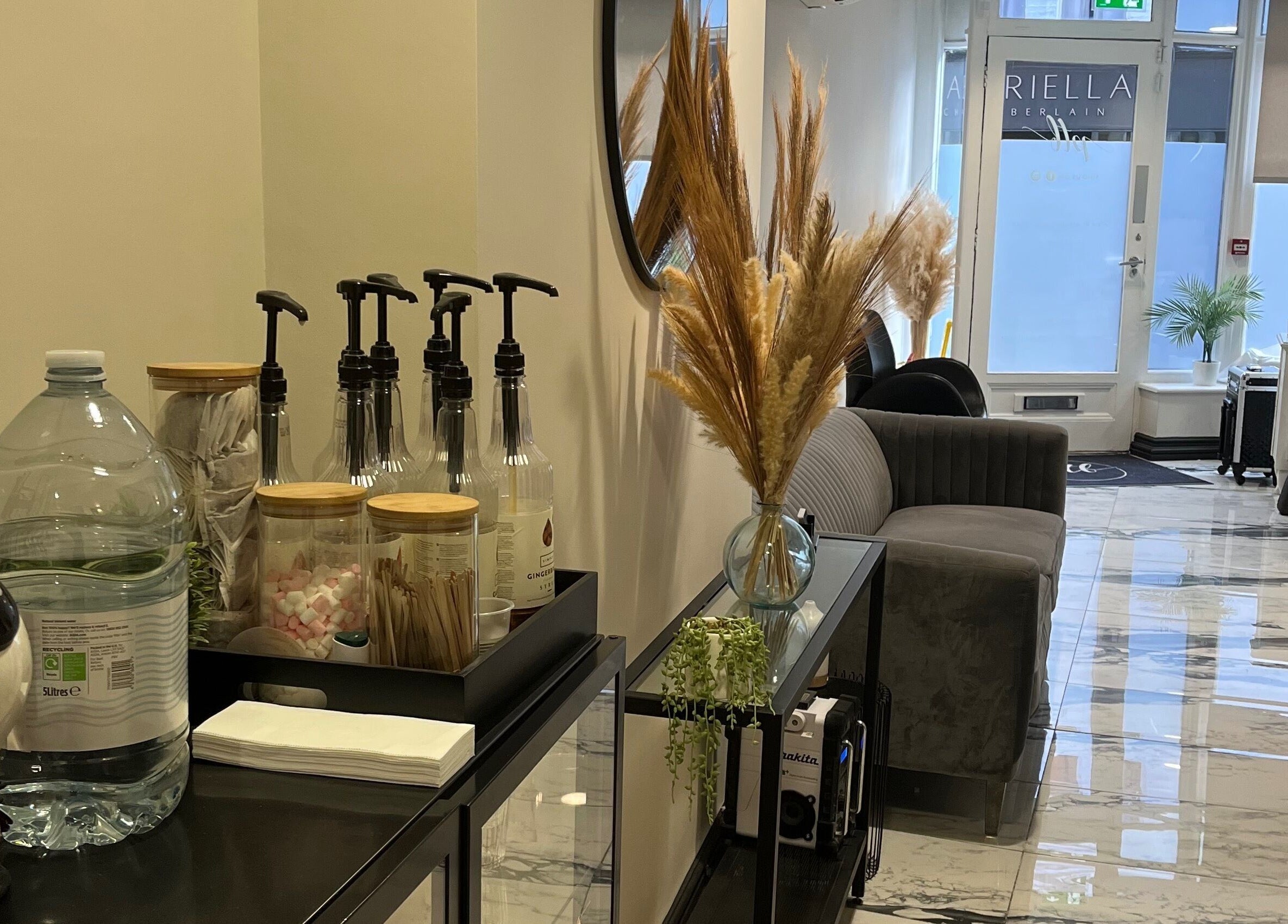 Cozy interior of My Skin Sanctuary, Eastbourne, England, GB with elegant decor and refreshments station.