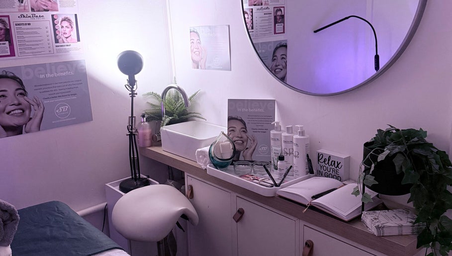 Calming skincare treatment room at Everything skyn, Manchester, England, GB with decor and products.