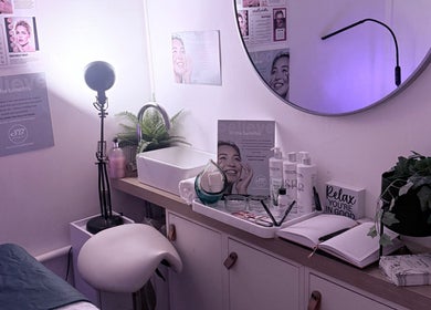 Calming skincare treatment room at Everything skyn, Manchester, England, GB with decor and products.