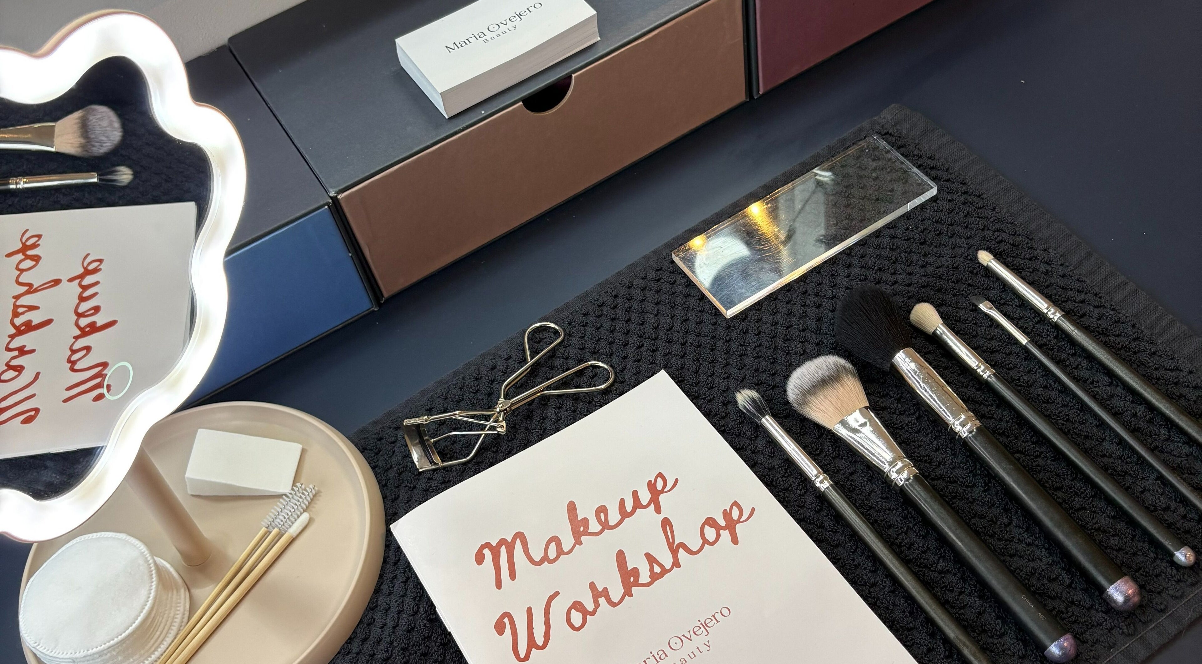 Makeup tools and workshop brochure at Maria Ovejero Beauty, Kortrijk, Vlaanderen, BE.