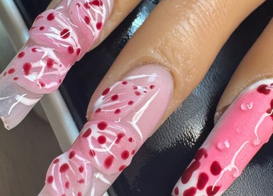 Elegant pink floral nail art at Alsnailsxx, County Longford, IE. Intricate design highlights nail beauty.