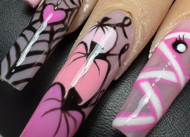 Intricate nail designs at Alsnailsxx in County Longford, County Longford, IE. Vibrant pink and black patterns.