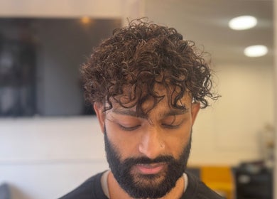 Stylish curly hairstyle for men at Hair&Beauty24, Waltham Abbey, England, GB salon.