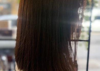 Sleek, straight brown hair treatment at Hair&Beauty24, Waltham Abbey, England, GB.