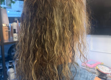 Luscious curly hair styled at Hair&Beauty24, Waltham Abbey, England, GB, showcasing premium hair care products.