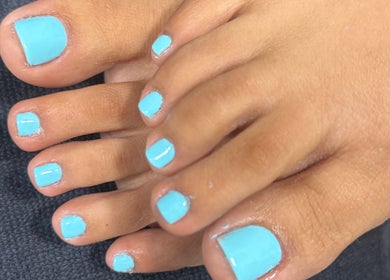 Sky-blue polished toenails at Hair&Beauty24 in Waltham Abbey, England, GB. Perfect for a fresh summer look.