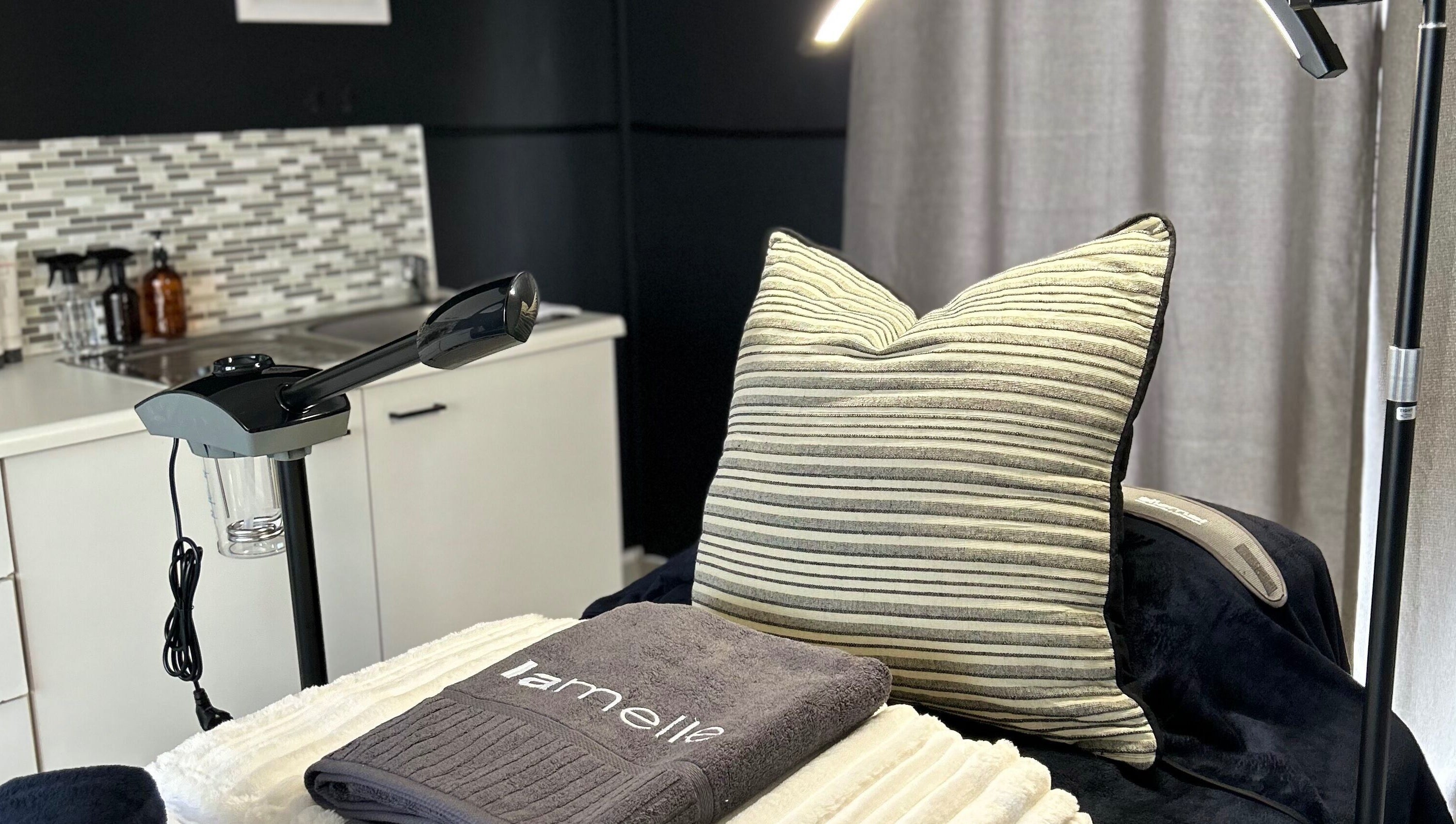 Elegant treatment room at Lavin Laser and Aesthetics, Centurion, Gauteng, ZA, featuring modern equipment.