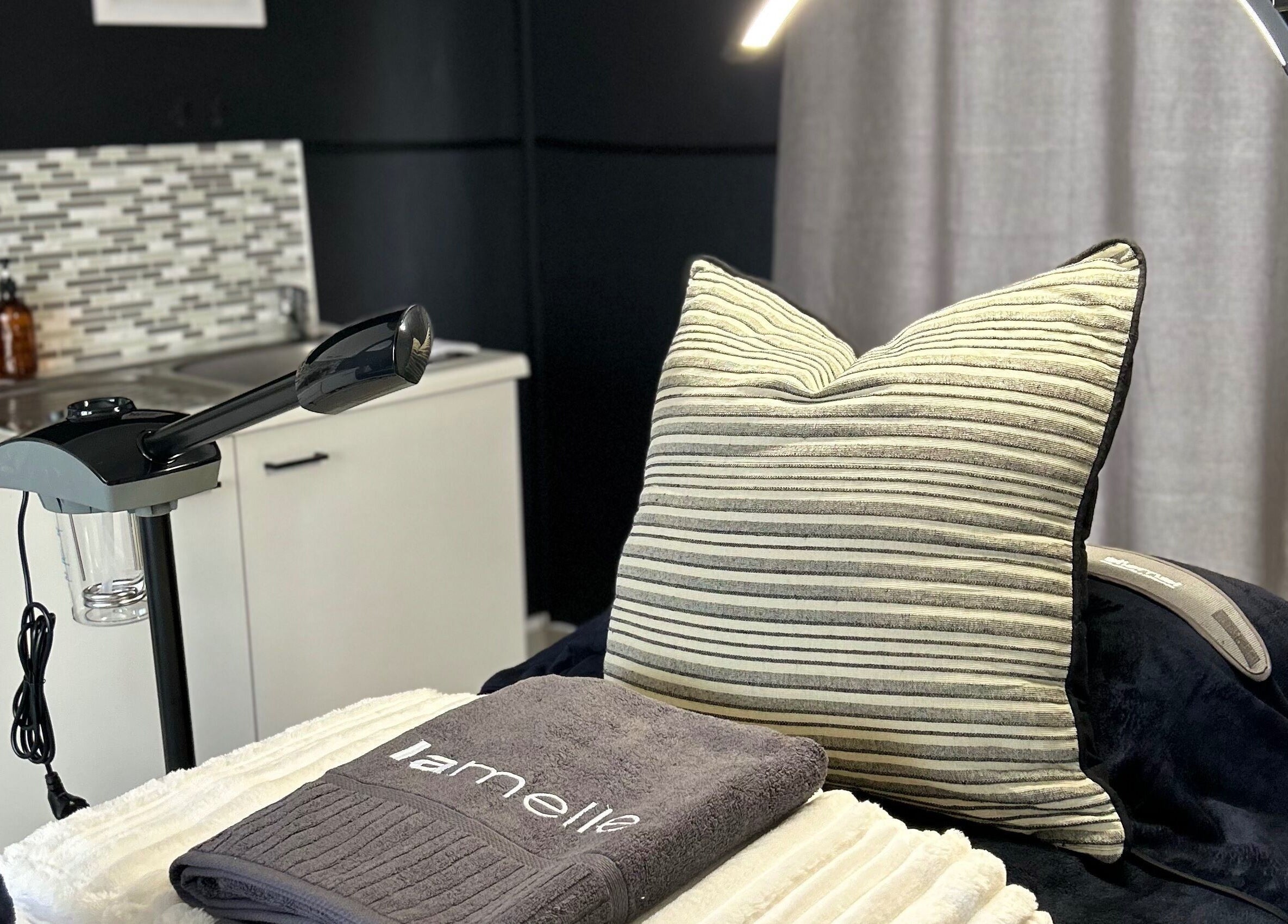 Elegant treatment room at Lavin Laser and Aesthetics, Centurion, Gauteng, ZA, featuring modern equipment.