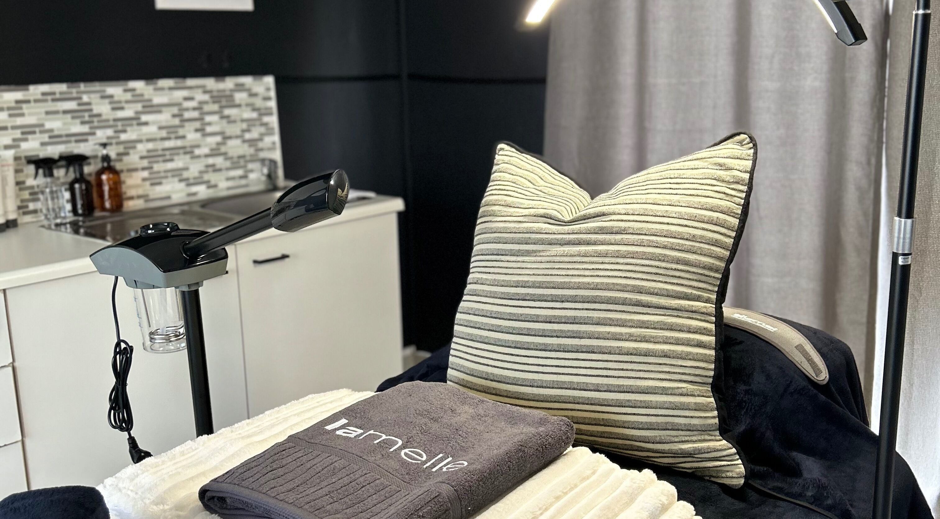 Elegant treatment room at Lavin Laser and Aesthetics, Centurion, Gauteng, ZA, featuring modern equipment.