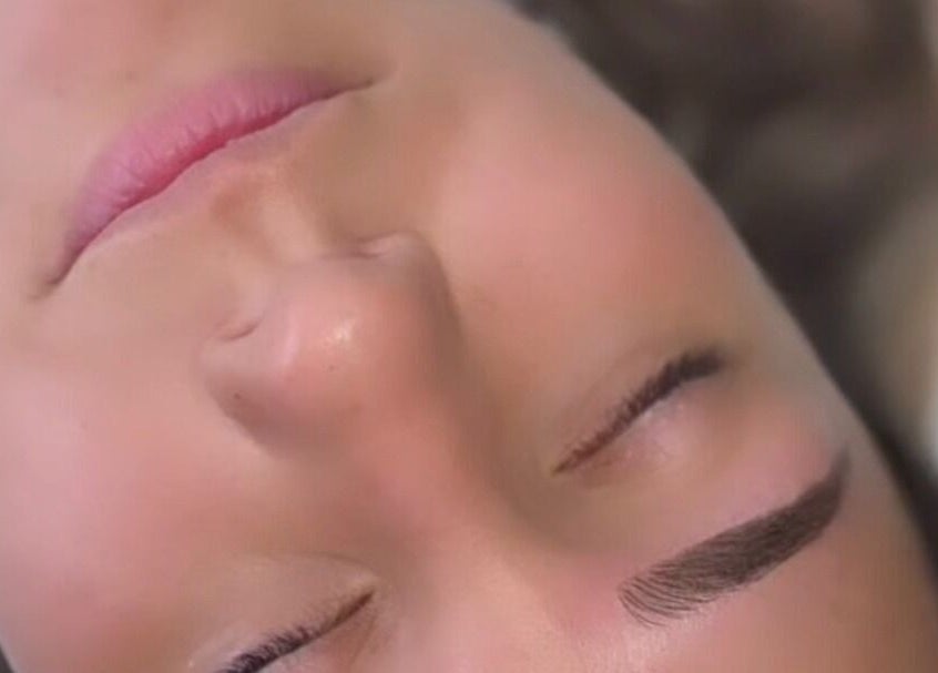Close-up of a woman's face showcasing perfect eyebrows by Pro Brows.Studio in Normanton, England, GB.