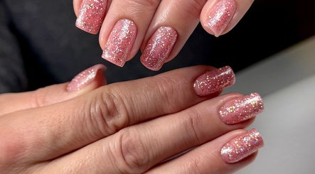 Glittery pink nails manicure at SABeauty, Southborough, England, GB showcasing elegance and style.