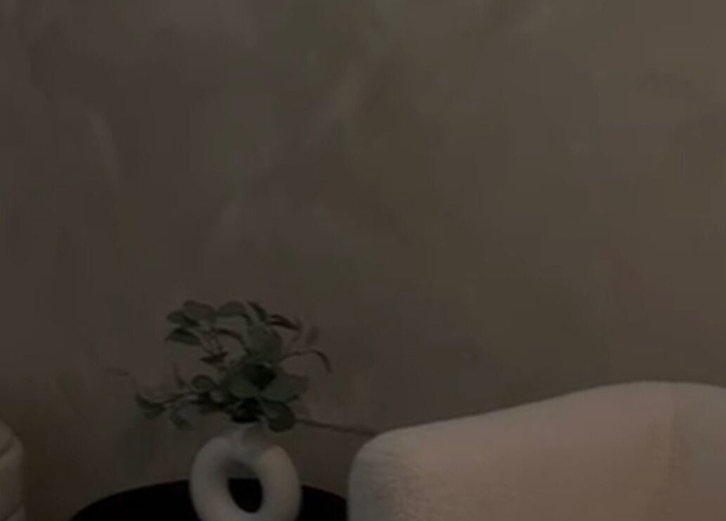 Elegant lounge with sleek furniture at Skin by Nay, Toa Baja, Puerto Rico, PR, offering a serene ambiance.