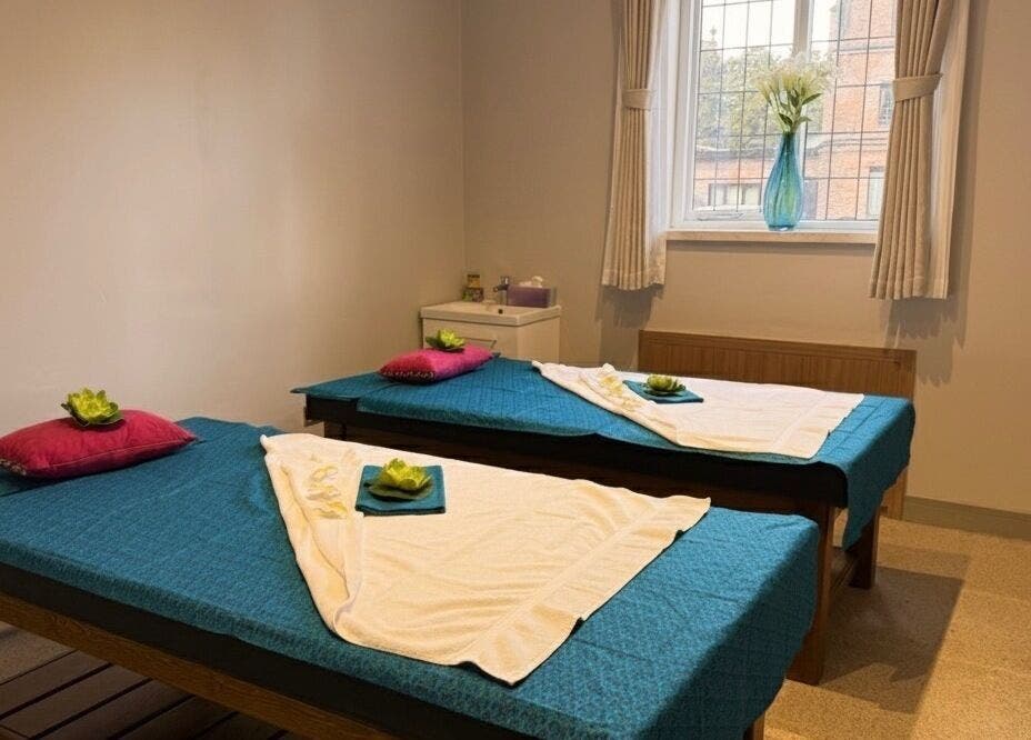 Peaceful spa room with two massage tables at Hannah Thai Spa, Birmingham, England, GB.
