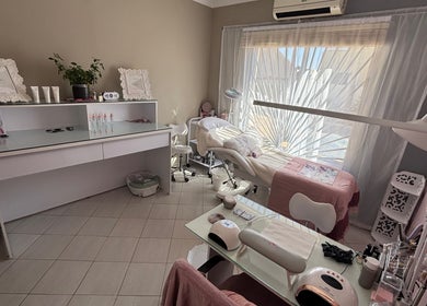 Relaxing treatment room at Ava Beauty in Windhoek, Khomas Region, NA, with spa bed and serene decor.