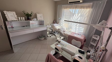 Relaxing treatment room at Ava Beauty in Windhoek, Khomas Region, NA, with spa bed and serene decor.