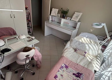 Cozy treatment room at Ava Beauty in Windhoek, Khomas Region, NA featuring a bed and modern equipment.