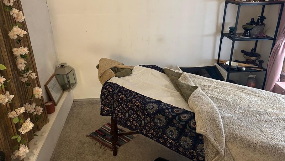 Relaxing massage room at Hands Of Nature Massage Therapy in Kineton, England, GB, featuring a cozy massage table.