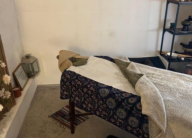 Relaxing massage room at Hands Of Nature Massage Therapy in Kineton, England, GB, featuring a cozy massage table.