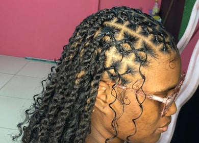 Intricate braided hairstyle at Slayed_By_Christine, Siparia, Siparia Regional Corporation, TT.