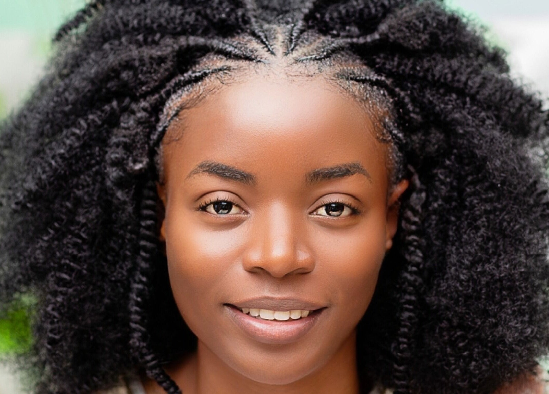 Woman with natural curls at Natural Kurls Kabulonga Branch, Lusaka, Lusaka Province, ZM.