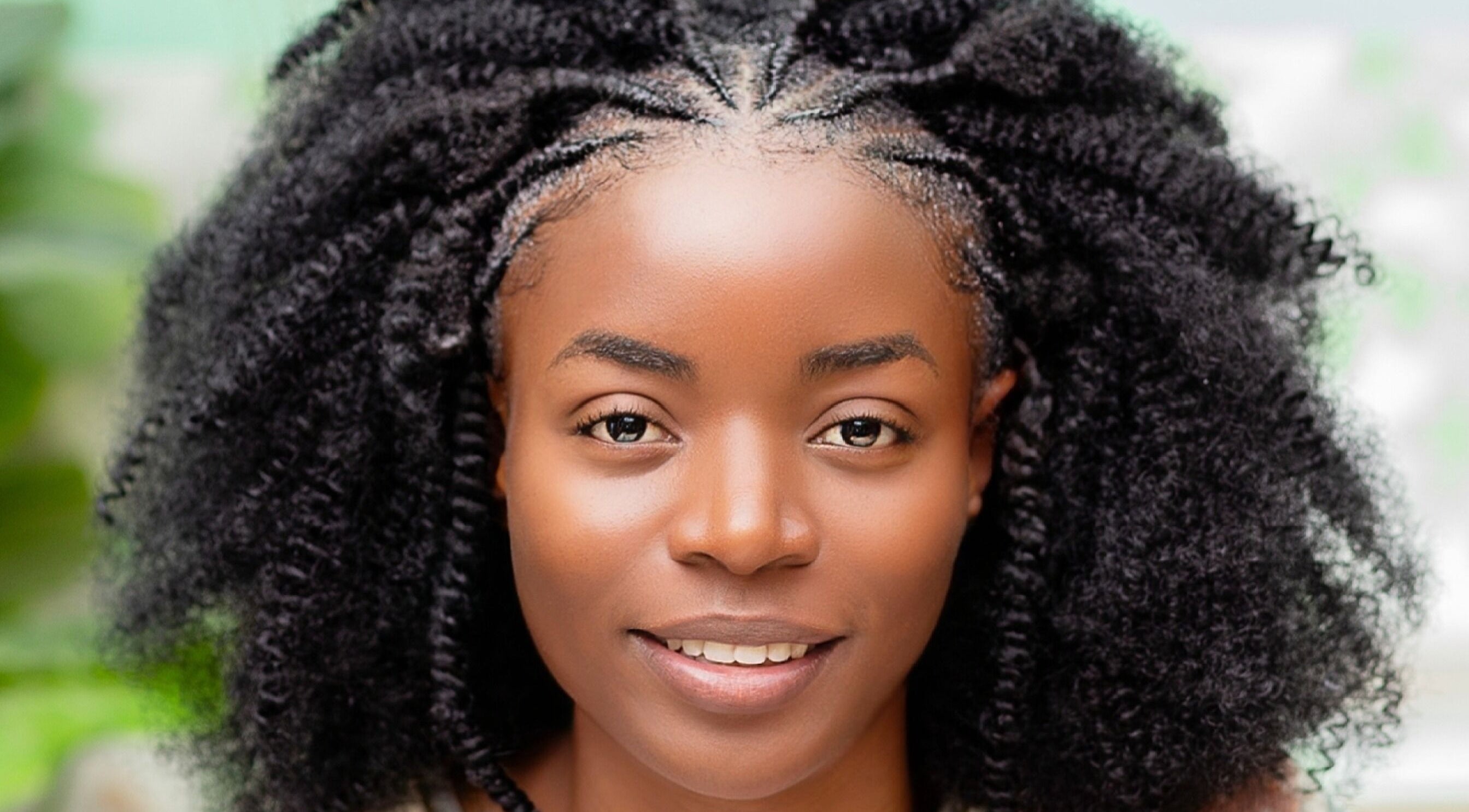 Woman with natural curls at Natural Kurls Kabulonga Branch, Lusaka, Lusaka Province, ZM.
