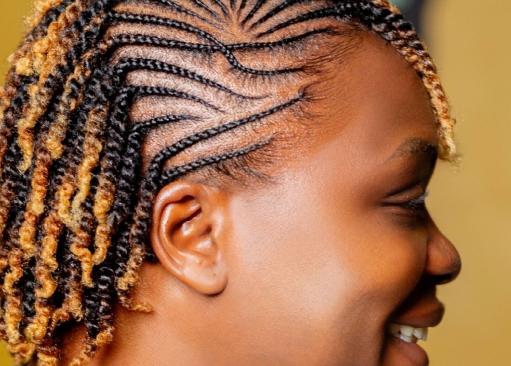 Stylish braided hairstyle at Natural Kurls Kitwe Branch, Kitwe, Copperbelt Province, ZM.